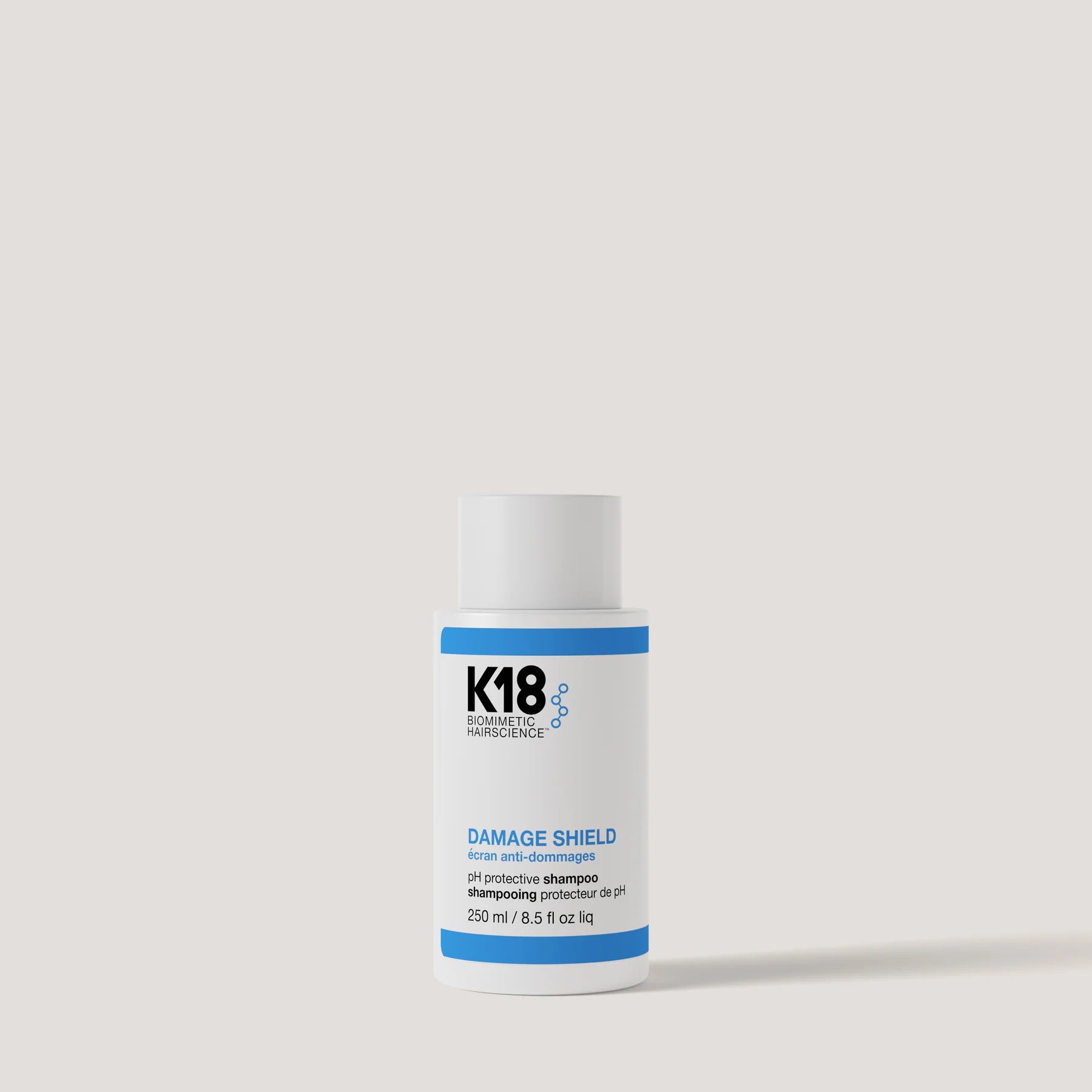 K18 DAMAGE SHIELD pH Beschermende Shampoo van Kaat Schrauwen, grijze fles, 8,5 oz, verzorgt en beschermt beschadigd haar.
